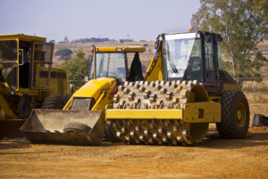 Two construction vehicles